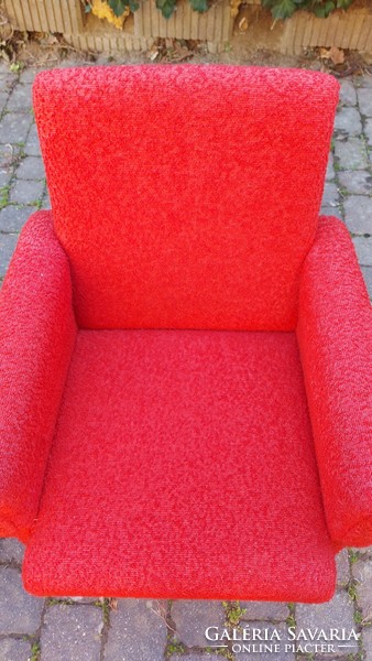 2 retro red swivel armchairs