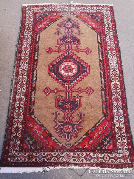 Antique Iranian wool rug. Hand knotted, from apartment.