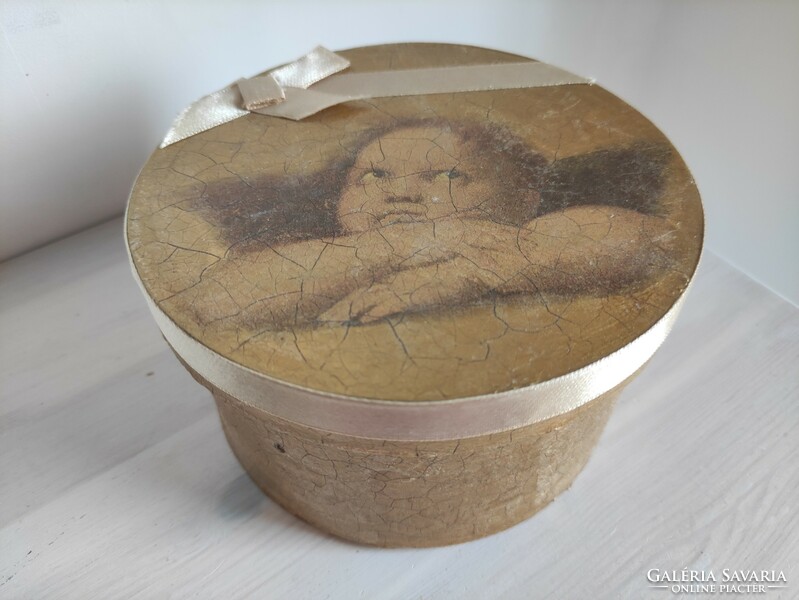 Round thin wooden box decorated with a dreamy angel image