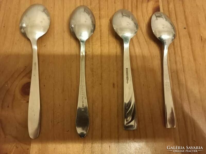 4 different stainless steel teaspoons