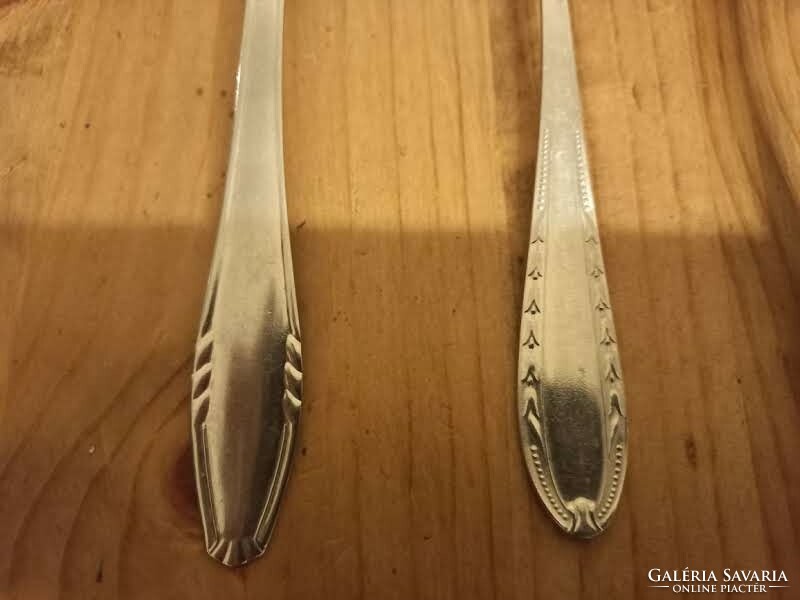 4 different stainless steel spoons