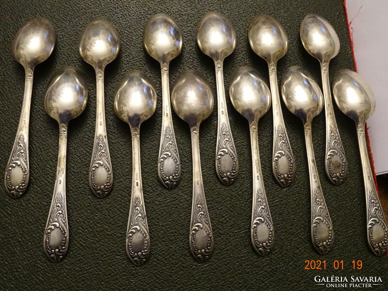 Set of 12 silver tea spoons with baroque motif