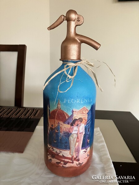 Decoupaged soda bottle