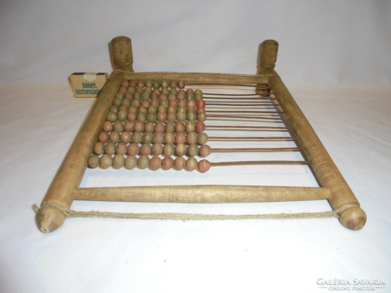 Antique wooden ball abacus, hand calculator