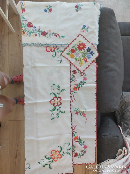 Embroidered tablecloths in one