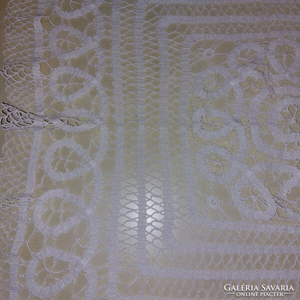 Crocheted white rectangular tablecloth