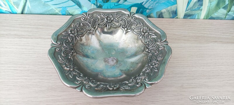 A fabulous silver-plated table with a base