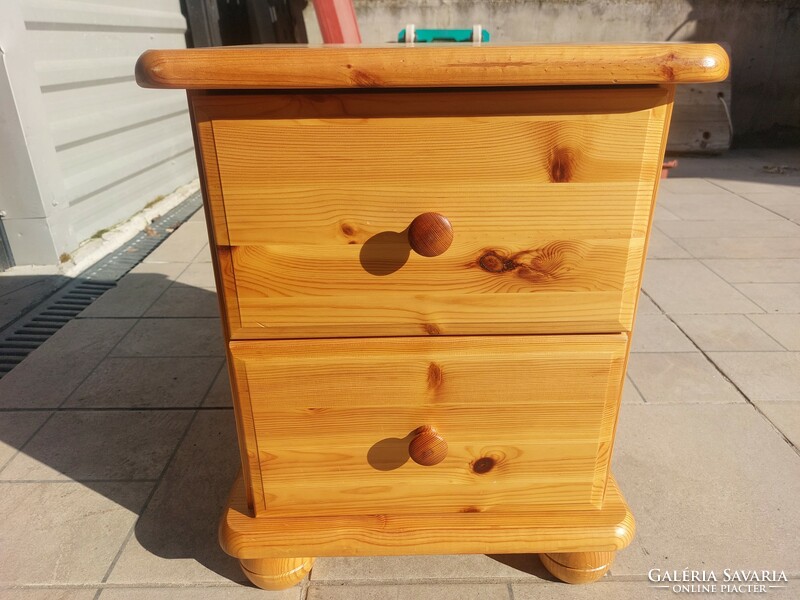 A 2-drawer pine chest of drawers and nightstand for sale. Furniture is in like new condition.