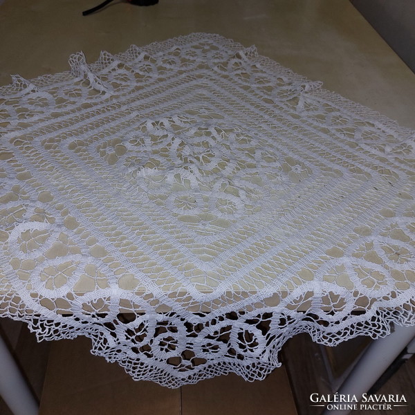 Crocheted white rectangular tablecloth