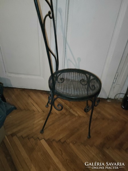 1 iron chair with a small defect