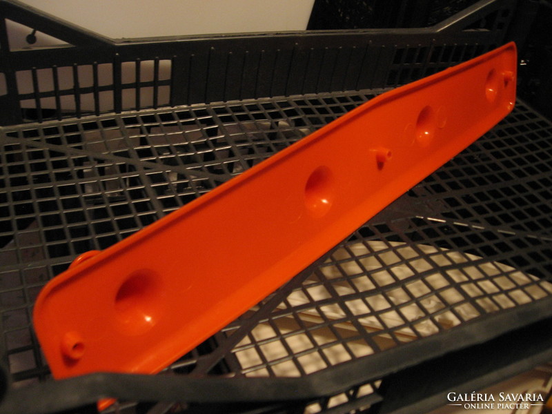 Retro orange red plastic wall hanger