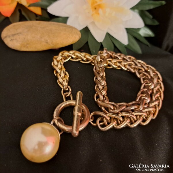 Gilded Israeli necklaces.