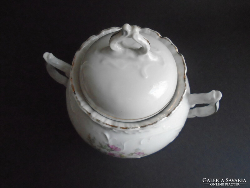 Large, chubby, antique sugar bowl.