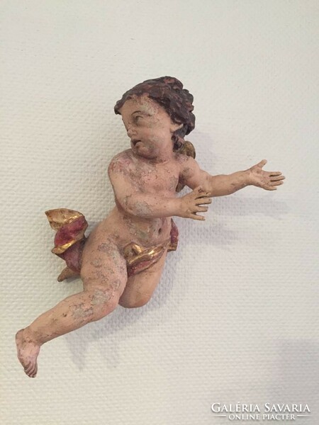 18th-century wood-carved putto
