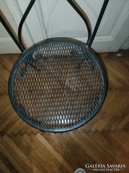 1 iron chair with a small defect