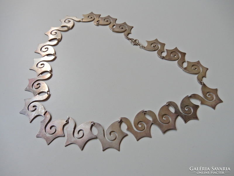 Old silver necklace with special pattern