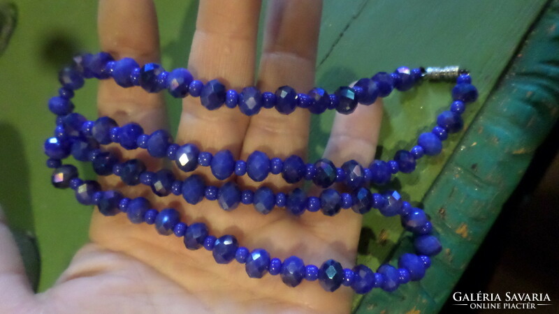 54 Cm necklace made of dark blue crystal beads.