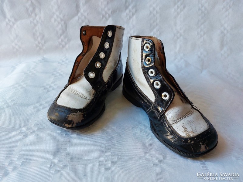 Old children's shoes black and white vintage decoration
