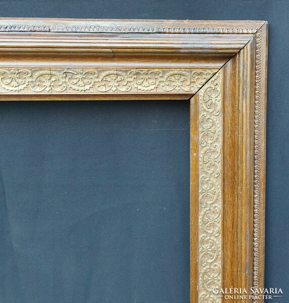 Antique wooden frame with detailed blondel decoration. 65.5X81