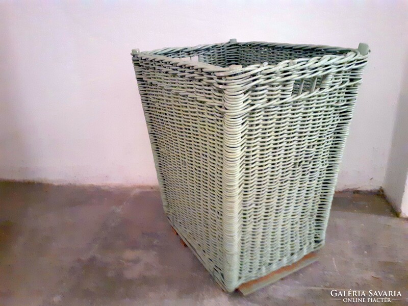 Large, pale green wicker basket