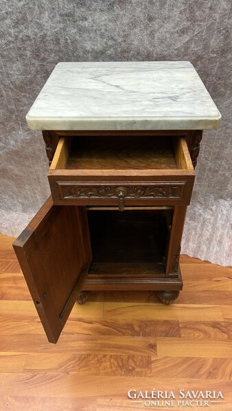 Antique carved oak chest of drawers with marble top