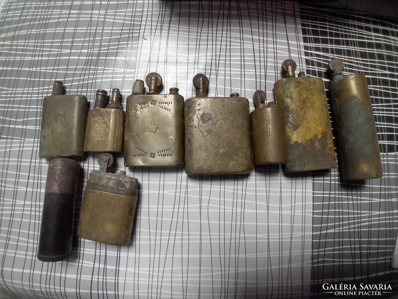 Old copper petrol lighters