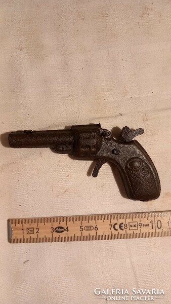 Very old iron plate toy gun in mint condition (works)