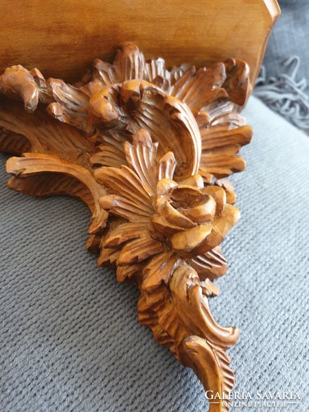 Pair of carved wooden wall brackets