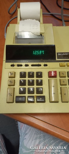Retro tape calculator sharp