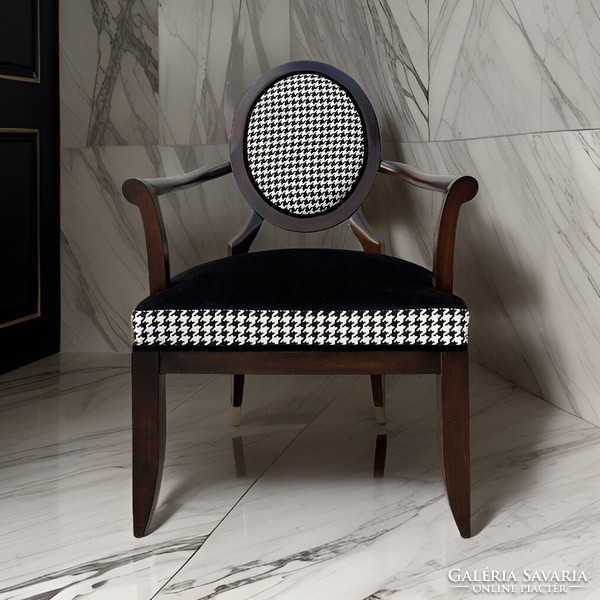 Design armchair with houndstooth pattern upholstery