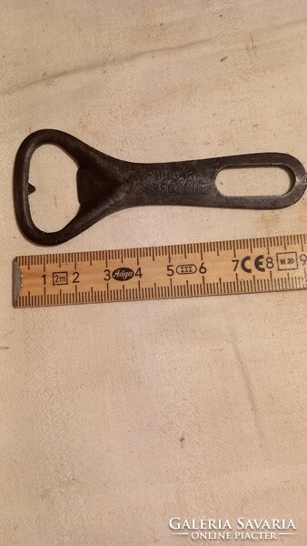 Beer opener with the inscription 