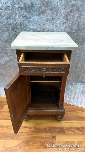 Antique carved oak chest of drawers with marble top