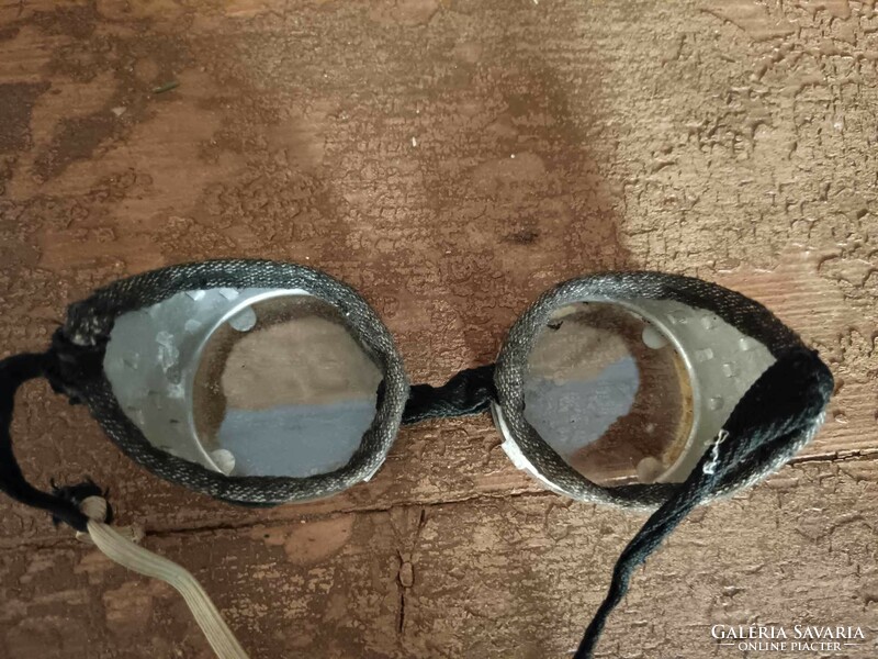 Motorcycle or protective glasses, glass and aluminum combination, maybe car or airplane glasses