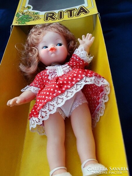 Symptomatic vintage doll