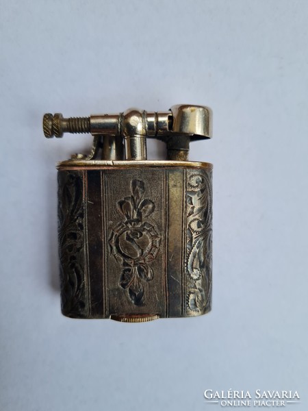 Antique silver petrol lighter