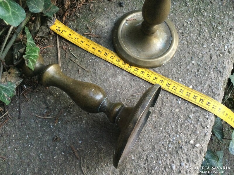 An old pair of smaller shaped candle holders