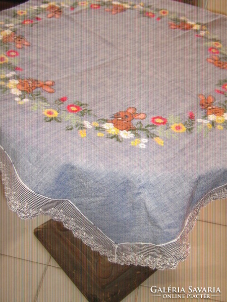 Beautiful machine-embroidered Easter madeira table cloth with a lace edge