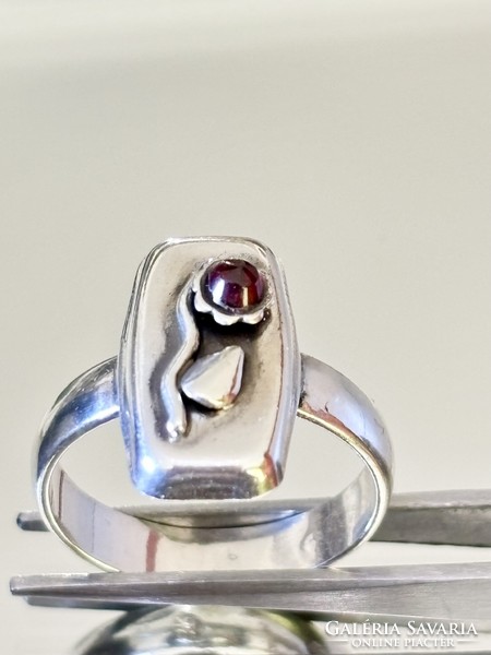 Handmade vintage silver ring, embellished with a garnet stone