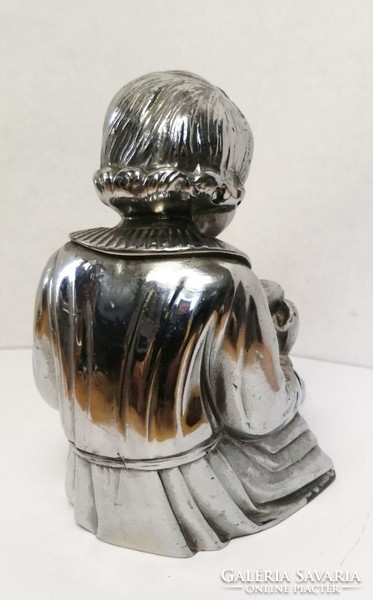 Reading girl. A pewter statue with a silver-plated surface. A unique rarity