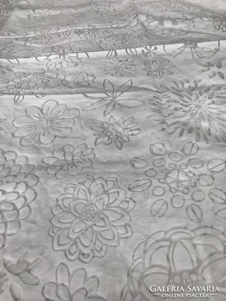 A pair of openwork floral pattern curtains, size 240 x 145 cm