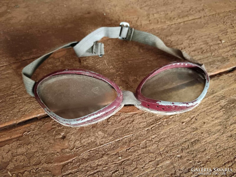 Motorcycle or car glasses, burgundy worn, material aluminum, lens plastic, but in very good condition