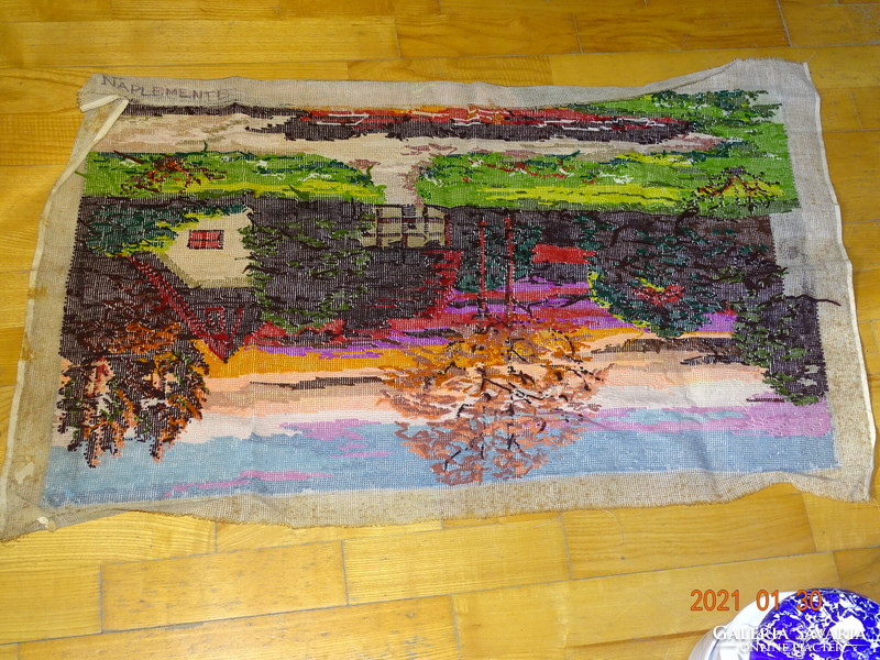 Old large tapestry tapestry image at sunset