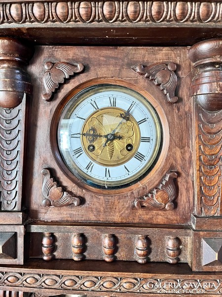 Antique half-baked wall clock from around 1880