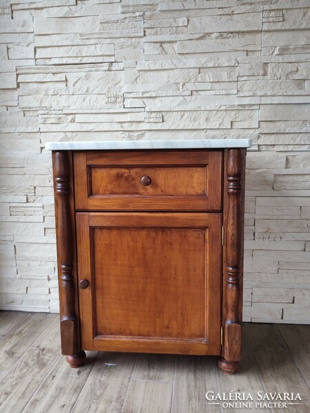 Chest of drawers with carved mirror