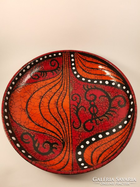 Juried onion pattern ceramic wall plate