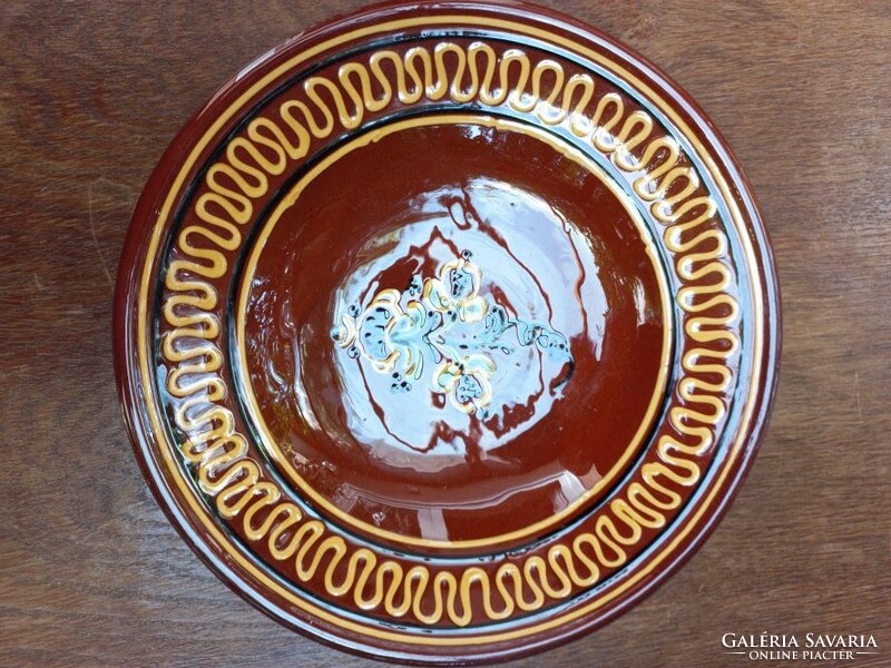Glazed ceramic wall plate