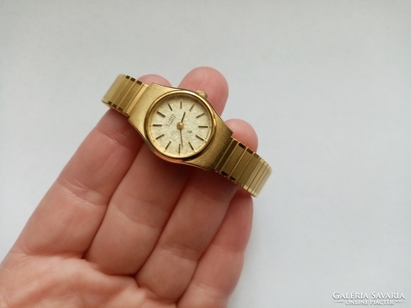 For sale, vintage gold-colored citizen wristwatch
