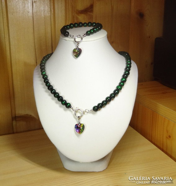 Necklaces made of special green beautiful shiny glass beads with swarovski crystal pendants are now fashionable