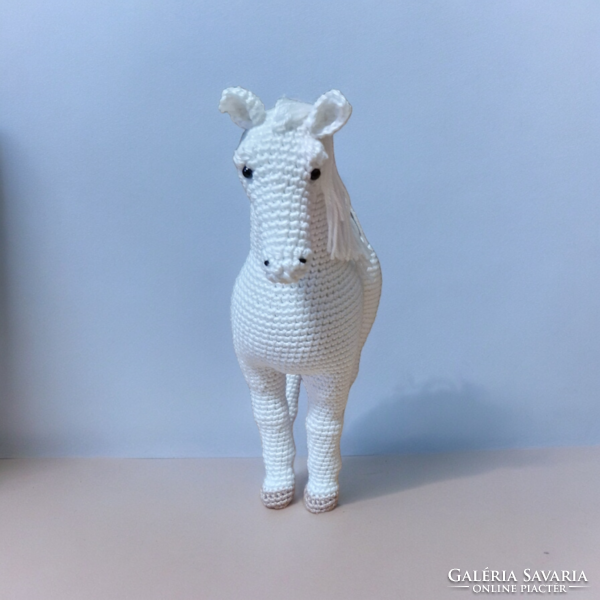 Lifelike horse crocheted by hand using the amigurumi technique