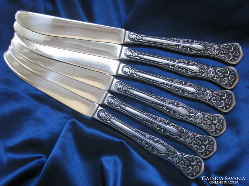 Set of antique Russian cutlery with a lotus flower pattern